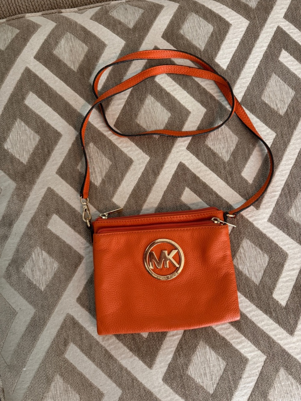 Michael Kors Orange Pebbled Leather Crossbody with Gold MK Emblem